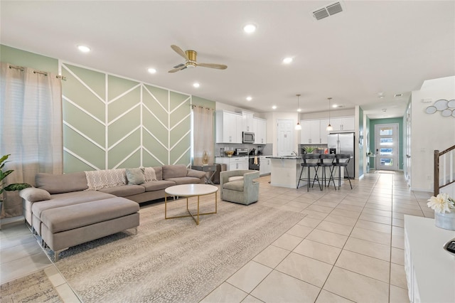 1809 Tropical Palms Cir, Kissimmee, FL 34747 - living room featuring recessed lighting, a ceiling fan, and light tile patterned floors
