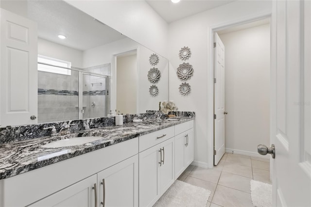 1809 Tropical Palms Cir, Kissimmee, FL 34747 - bathroom featuring double vanity, a stall shower, and tile patterned flooring