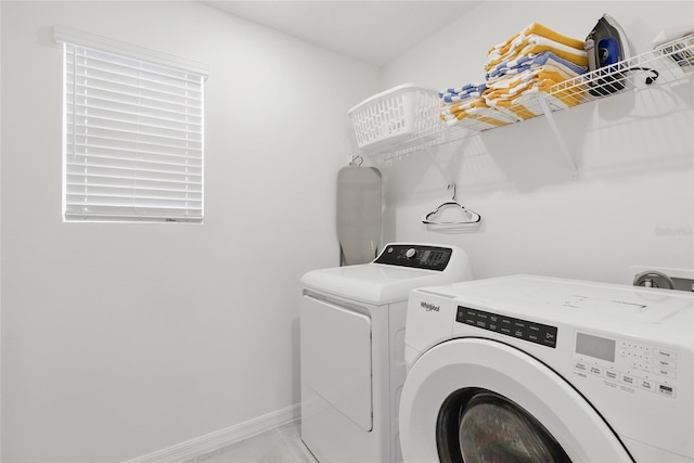 1809 Tropical Palms Cir, Kissimmee, FL 34747 - laundry area with independent washer and dryer and baseboards