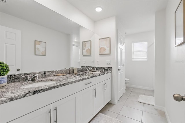 1809 Tropical Palms Cir, Kissimmee, FL 34747 - full bathroom featuring double vanity and tile patterned floors