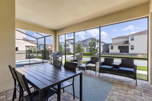 1809 Tropical Palms Cir, Kissimmee, FL 34747 - sunroom / solarium with a hot tub and a residential view