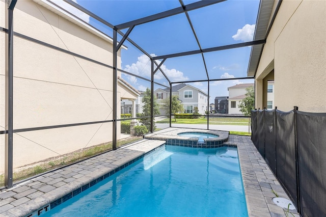 1809 Tropical Palms Cir, Kissimmee, FL 34747 - view of swimming pool with a lanai, a pool with connected hot tub, a residential view, and a patio area
