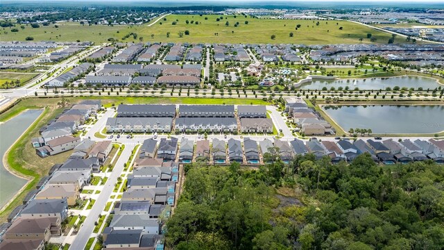 1809 Tropical Palms Cir, Kissimmee, FL 34747 - aerial overview of property's location featuring a nearby body of water and nearby suburban area