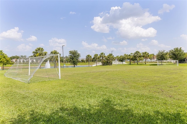 1809 Tropical Palms Cir, Kissimmee, FL 34747 - view of yard with an area for sports and a water view