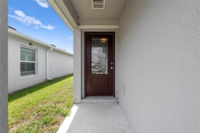 236 Miles Ct, Davenport, FL 33837 - property entrance with stucco siding