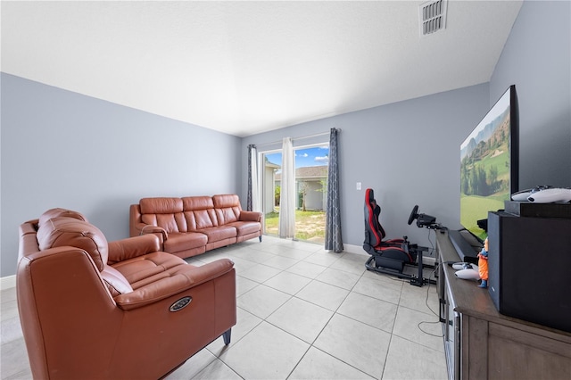 236 Miles Ct, Davenport, FL 33837 - living room featuring light tile patterned floors and baseboards