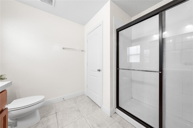 236 Miles Ct, Davenport, FL 33837 - full bathroom featuring vanity, toilet, a shower stall, and baseboards