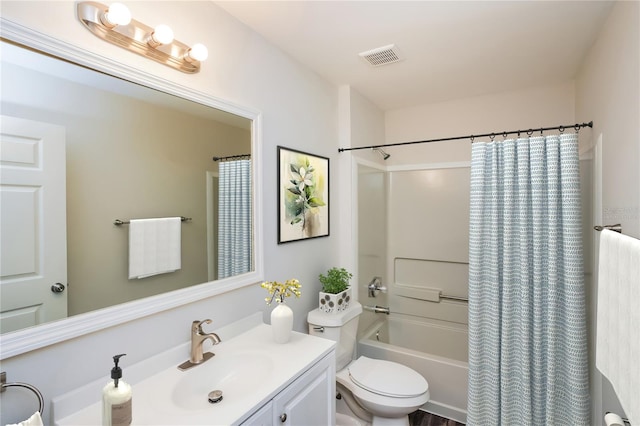 11212 3rd Ave E, Bradenton, FL 34212 - bathroom with vanity, shower / tub combo with curtain, and toilet