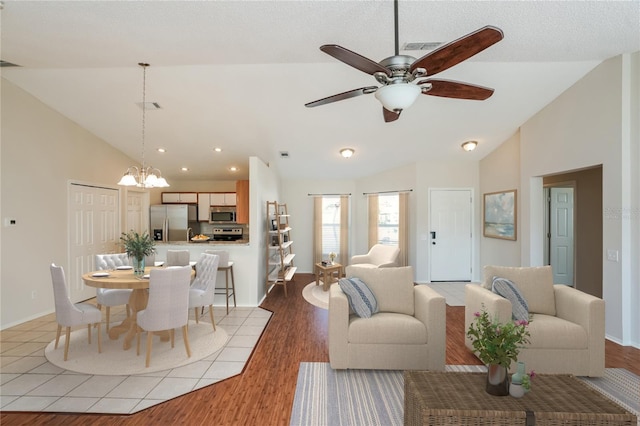 11212 3rd Ave E, Bradenton, FL 34212 - living area featuring light wood-style floors, a chandelier, a ceiling fan, baseboards, and recessed lighting