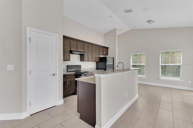 1206 Beechdale Ct, Deltona, FL 32725 - kitchen featuring black / electric stove, freestanding refrigerator, under cabinet range hood, lofted ceiling, and an island with sink