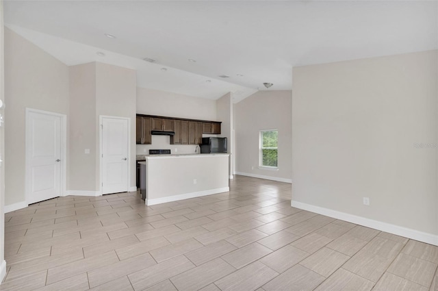1206 Beechdale Ct, Deltona, FL 32725 - unfurnished living room featuring baseboards and high vaulted ceiling
