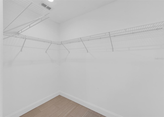 1206 Beechdale Ct, Deltona, FL 32725 - spacious closet featuring light wood-style floors