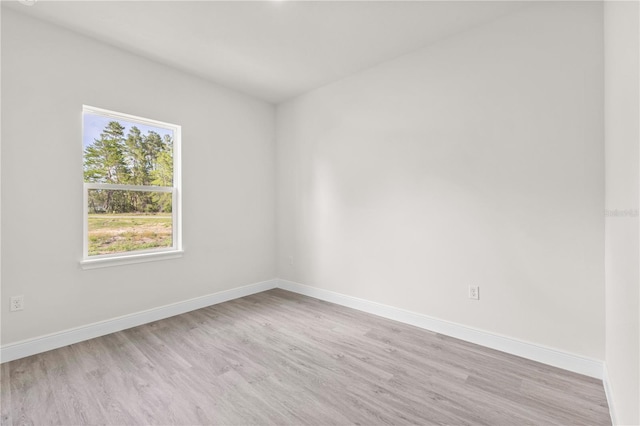 3749 SW 131st St, Ocala, FL 34473 - empty room with baseboards and light wood-style flooring