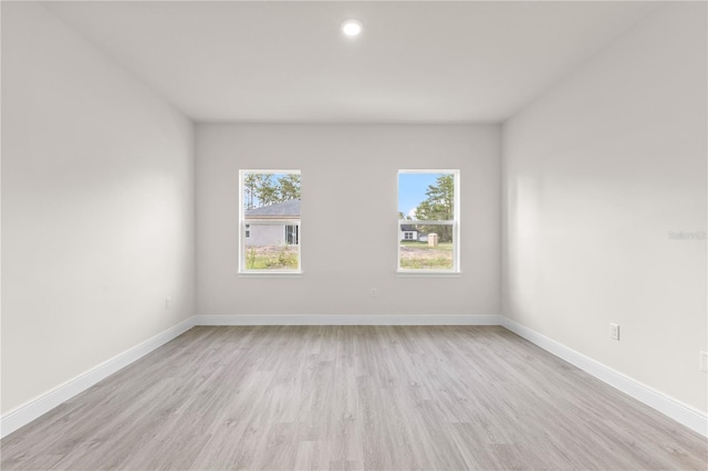 3749 SW 131st St, Ocala, FL 34473 - spare room featuring light wood finished floors, baseboards, and recessed lighting