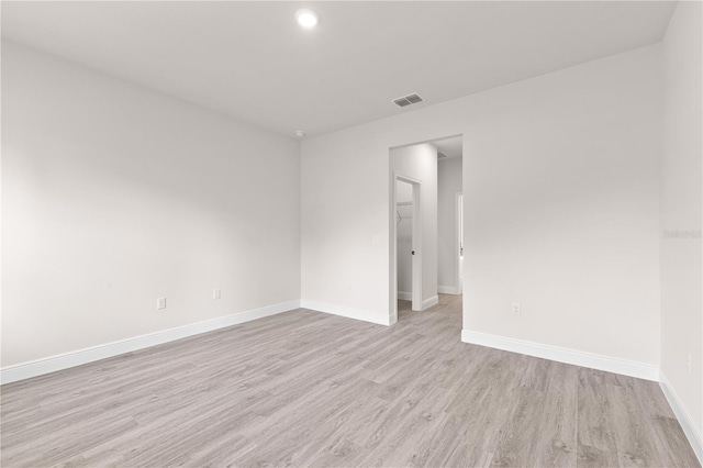 3749 SW 131st St, Ocala, FL 34473 - empty room featuring light wood finished floors, baseboards, and recessed lighting