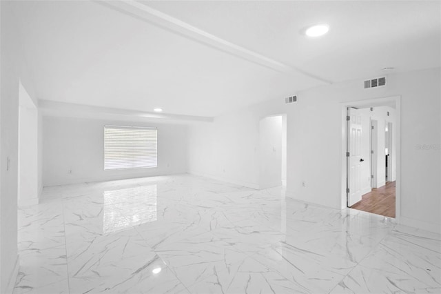 1511 E Horatio Ave, Maitland, FL 32751 - empty room featuring marble look tile flooring, recessed lighting, and baseboards