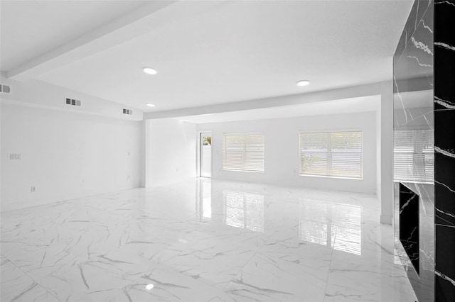 1511 E Horatio Ave, Maitland, FL 32751 - empty room featuring recessed lighting and marble look tile flooring