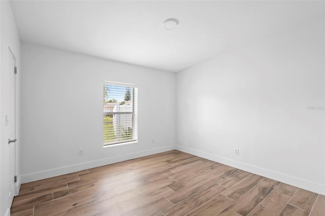 1511 E Horatio Ave, Maitland, FL 32751 - spare room with wood finished floors and baseboards