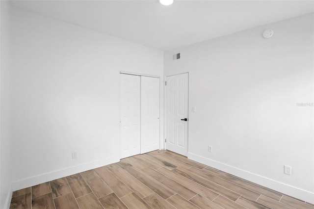 1511 E Horatio Ave, Maitland, FL 32751 - unfurnished room with wood finish floors, baseboards, and a smoke detector