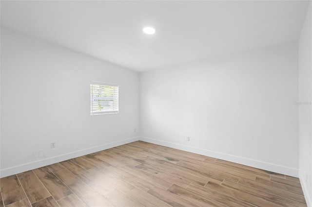 1511 E Horatio Ave, Maitland, FL 32751 - spare room featuring light wood finished floors, baseboards, and recessed lighting