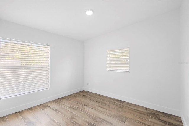 1511 E Horatio Ave, Maitland, FL 32751 - spare room with wood finished floors and baseboards