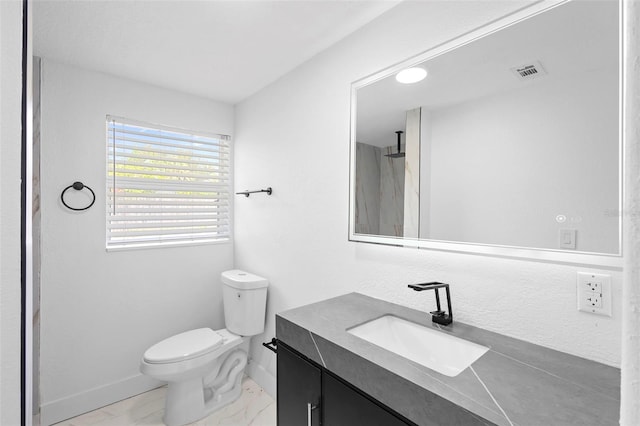 1511 E Horatio Ave, Maitland, FL 32751 - bathroom with vanity, baseboards, and toilet