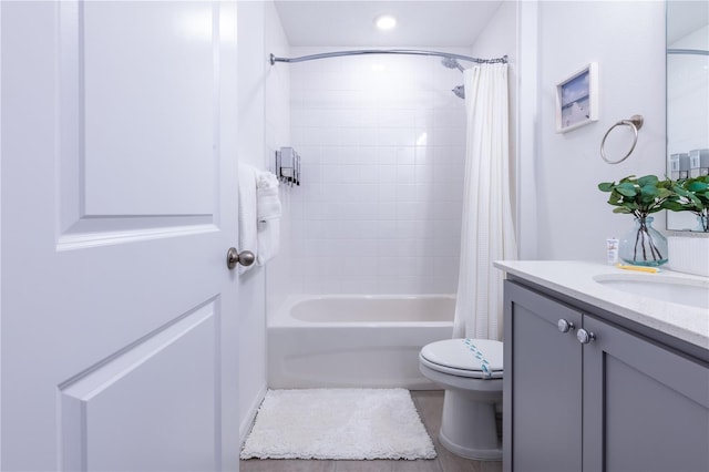 665 Longboat Dr, Davenport, FL 33896 - full bathroom with vanity, shower / tub combo with curtain, and toilet