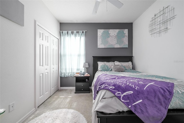 978 E 10th St, Apopka, FL 32703 - carpeted bedroom with a closet, baseboards, and a ceiling fan