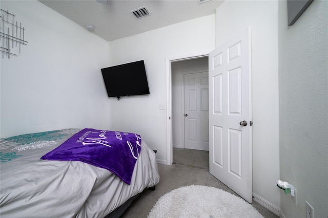978 E 10th St, Apopka, FL 32703 - bedroom with carpet flooring and baseboards