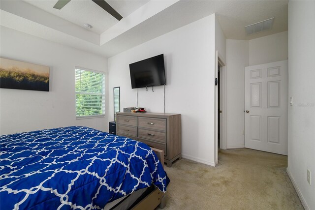 978 E 10th St, Apopka, FL 32703 - bedroom with light colored carpet, baseboards, and ceiling fan