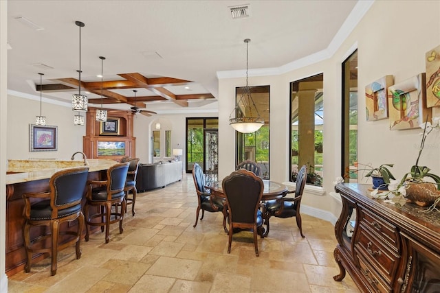 9253 Tibet Pointe Cir, Windermere, FL 34786 - dining space with stone tile floors, coffered ceiling, beamed ceiling, baseboards, and ornamental molding