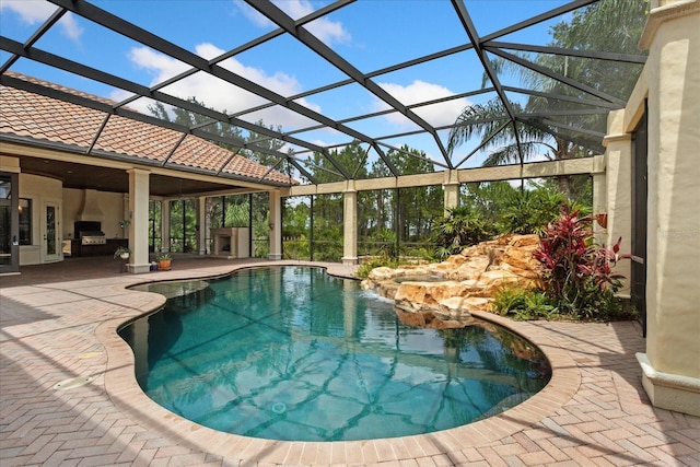 9253 Tibet Pointe Cir, Windermere, FL 34786 - outdoor pool featuring a patio and glass enclosure