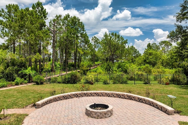 9253 Tibet Pointe Cir, Windermere, FL 34786 - view of patio / terrace with a fire pit