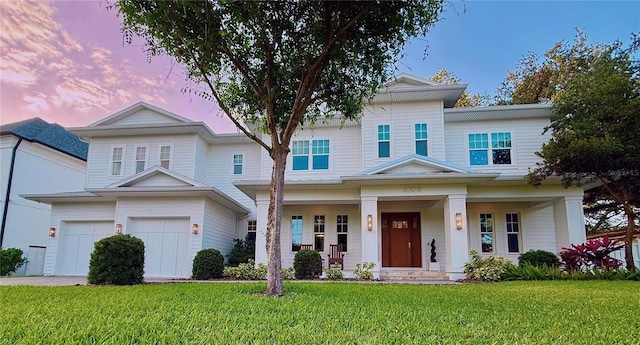 4309 W Beachway Dr, Tampa, FL 33609 - view of front of property featuring an attached garage, a front lawn, and a porch