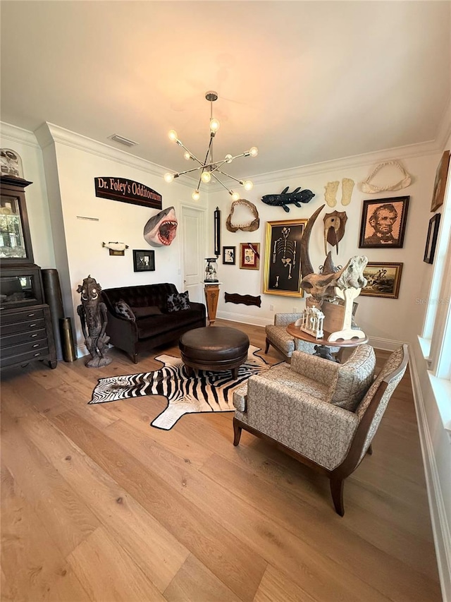 4309 W Beachway Dr, Tampa, FL 33609 - living area featuring a chandelier, ornamental molding, and wood finished floors