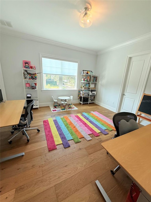 4309 W Beachway Dr, Tampa, FL 33609 - office area with ornamental molding, wood finished floors, and baseboards