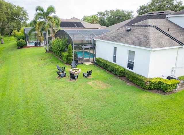1932 Reed Hill Dr, Windermere, FL 34786 - view of green lawn with a fire pit, an outdoor pool, and a lanai