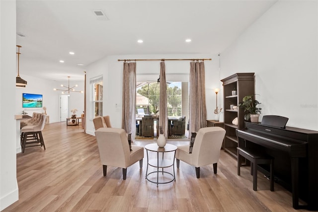 1932 Reed Hill Dr, Windermere, FL 34786 - sitting room featuring a chandelier, light wood-style floors, and recessed lighting