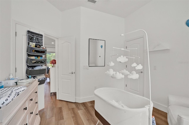 1932 Reed Hill Dr, Windermere, FL 34786 - bathroom with a freestanding tub, wood finished floors, vanity, and baseboards