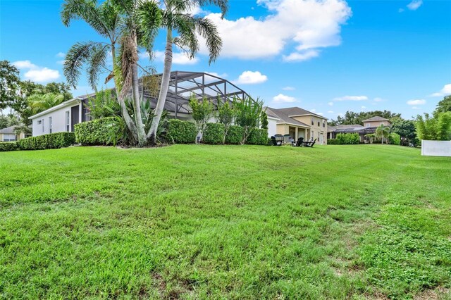 1932 Reed Hill Dr, Windermere, FL 34786 - view of green lawn featuring a lanai