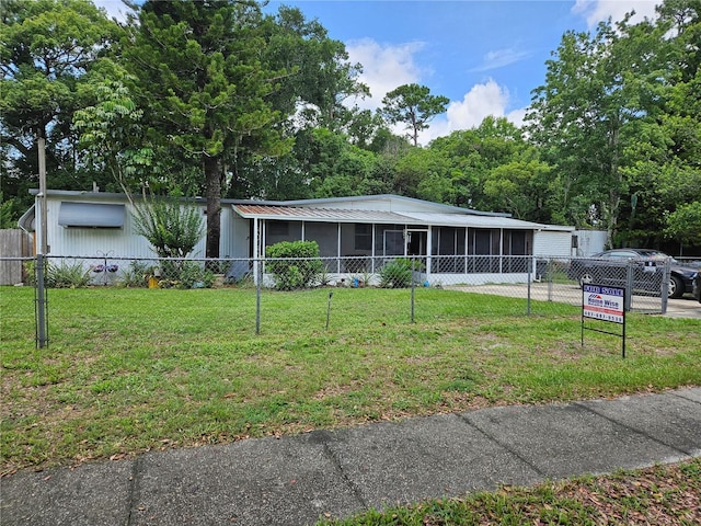 1525 Hilltop Rd, Casselberry, FL 32707 - manufactured / mobile home featuring a sunroom