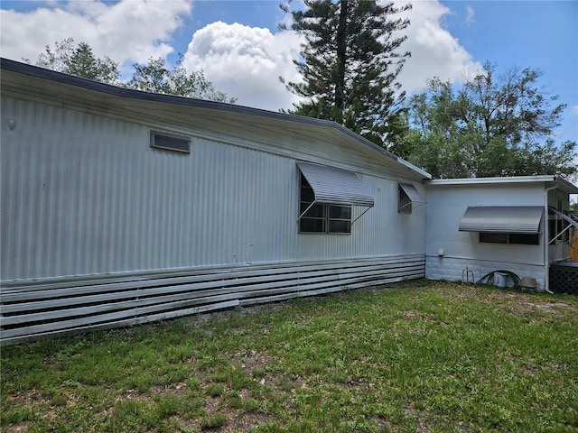 1525 Hilltop Rd, Casselberry, FL 32707 - view of property exterior with a lawn