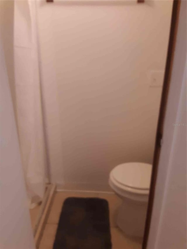1525 Hilltop Rd, Casselberry, FL 32707 - bathroom with toilet and a shower stall