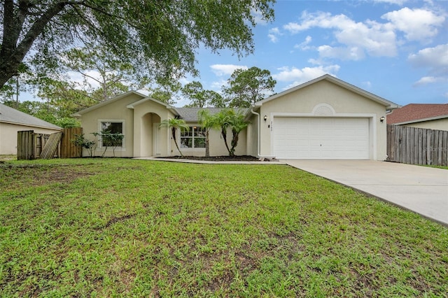 2142 Sapelo Ave SE Unit 18, Palm Bay, FL 32909 - single story home featuring stucco siding, concrete driveway, an attached garage, and a gate
