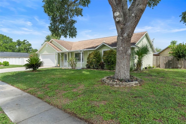 6906 Sawmill Blvd, Ocoee, FL 34761 - ranch-style home with concrete driveway, a porch, and a garage