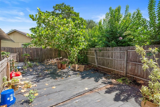 6906 Sawmill Blvd, Ocoee, FL 34761 - wooden deck with a fenced backyard