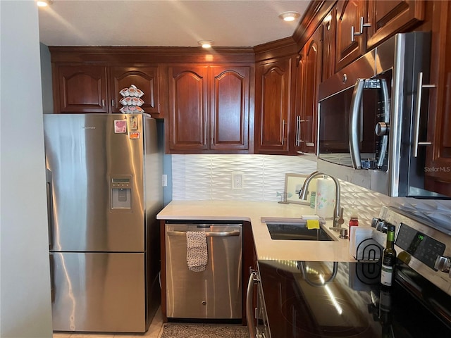 400 E Colonial Dr Unit 910, Orlando, FL 32803 - kitchen with appliances with stainless steel finishes, a sink, light countertops, and tasteful backsplash