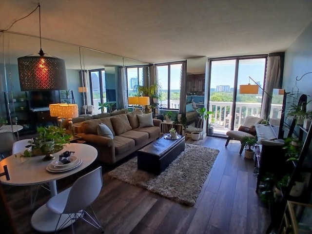 400 E Colonial Dr Unit 910, Orlando, FL 32803 - living area with wood finished floors and expansive windows