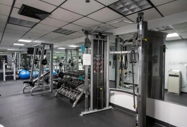 400 E Colonial Dr Unit 910, Orlando, FL 32803 - exercise room with a paneled ceiling