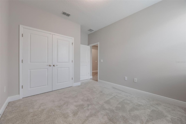 1740 Standing Rock Cir, Oakland, FL 34787 - unfurnished bedroom featuring carpet flooring and a closet